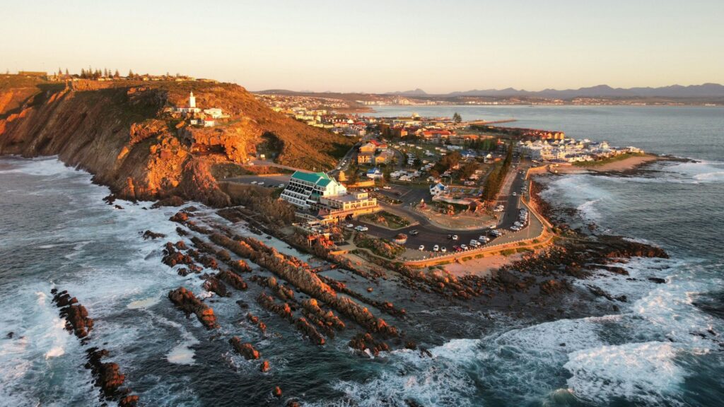 Aerial cityscape view of the Mossel Bay town by water, South Africa