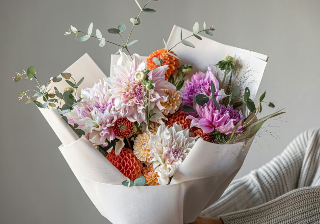 Close-up of a large festive bouquet with chrysanthemum flowers.